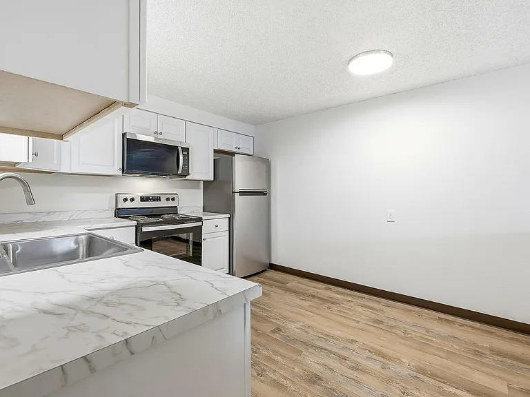1 Month Free Rent Move In Special! Under New Management! — Photo 2
