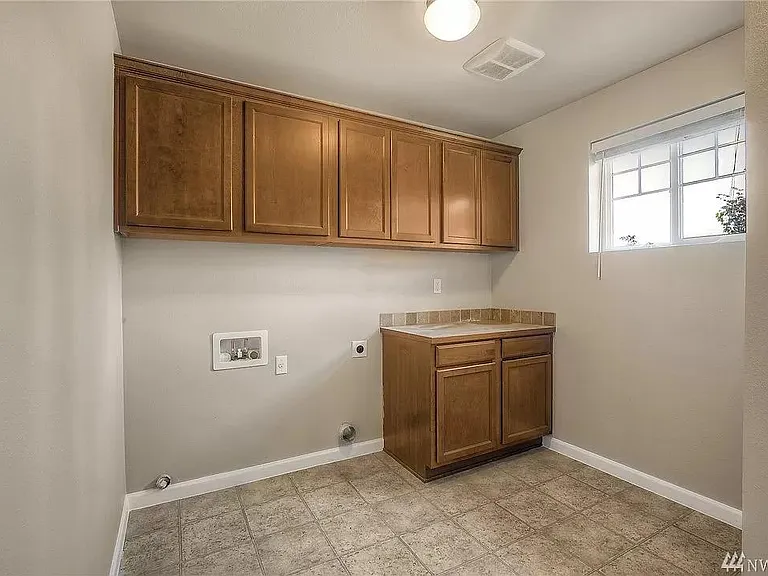 Large Laundry Room with Storage