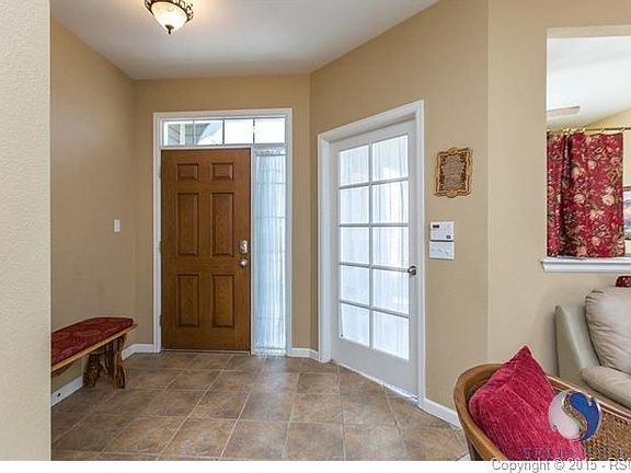 Open entry with French door to main level office.