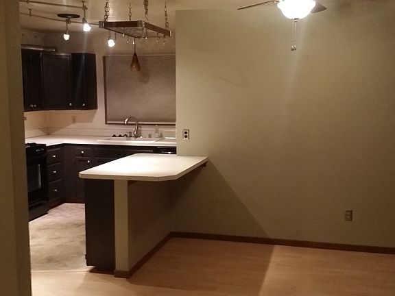 dining room + kitchen empty