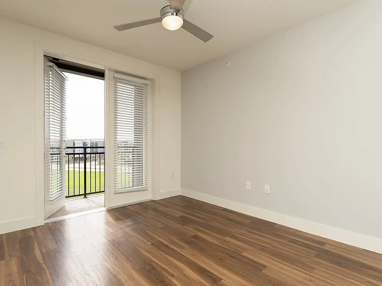 Living Room with Balcony and Hard Surface Flooring