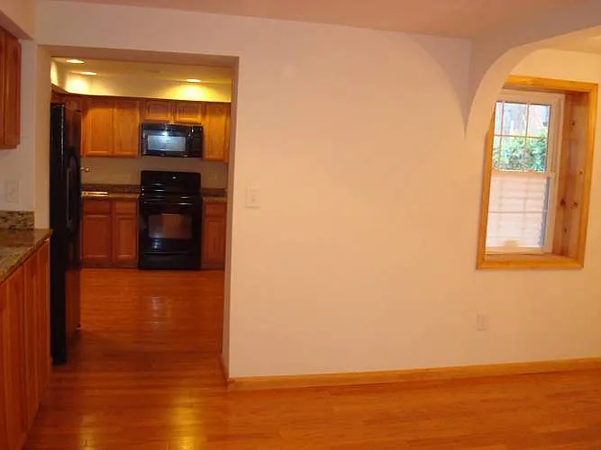 The dining room on right was converted to 3rd bedroom on main level.