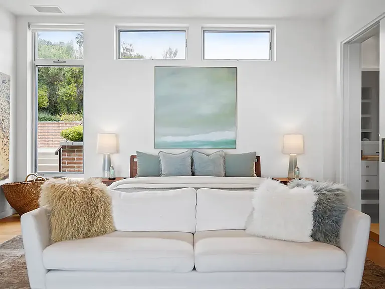 Includes a cozy in-room lounge area for relaxation.