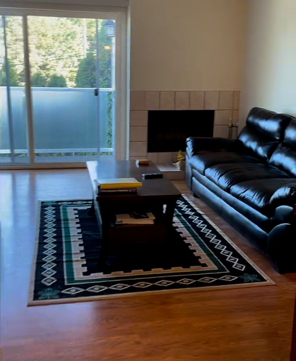 Living room opens to balcony.