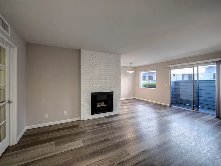 Two Bedroom Living Room View to Patio