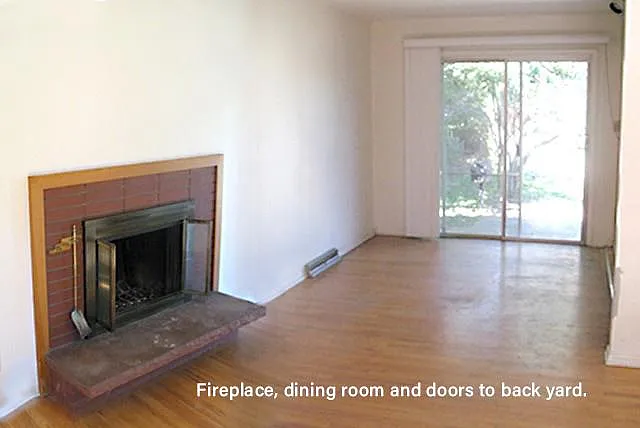 Fireplace, dining room and patio doors.
