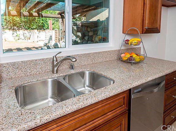 You'll be taking pleasure watching children play in the huge side yard and large patio area with thi