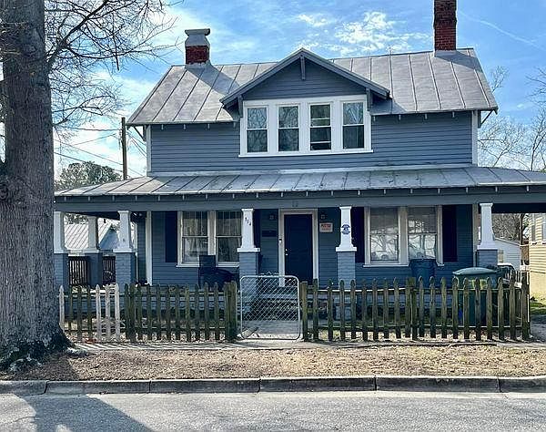 1st image of 114 E 12th St