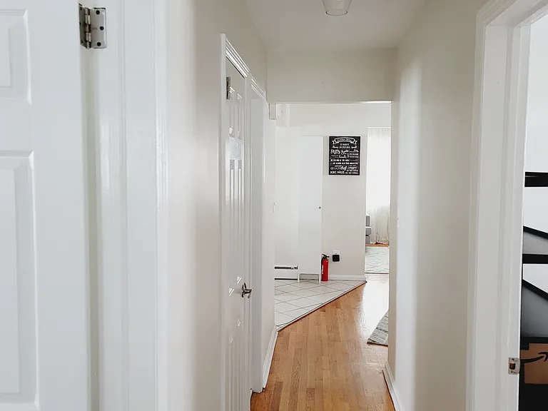 Rear Hallway to Bedrooms, Bathroom, and Living room
