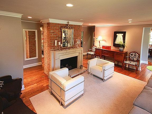 Formal living room w/ gas log fireplace
