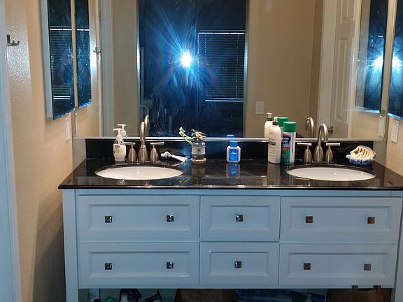 1 of 2 Similar bathrooms.