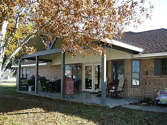 Extended covered back patio with country views!