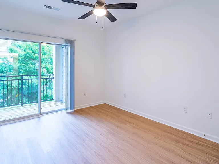 Bedroom with Balcony and Hard Surface Flooring