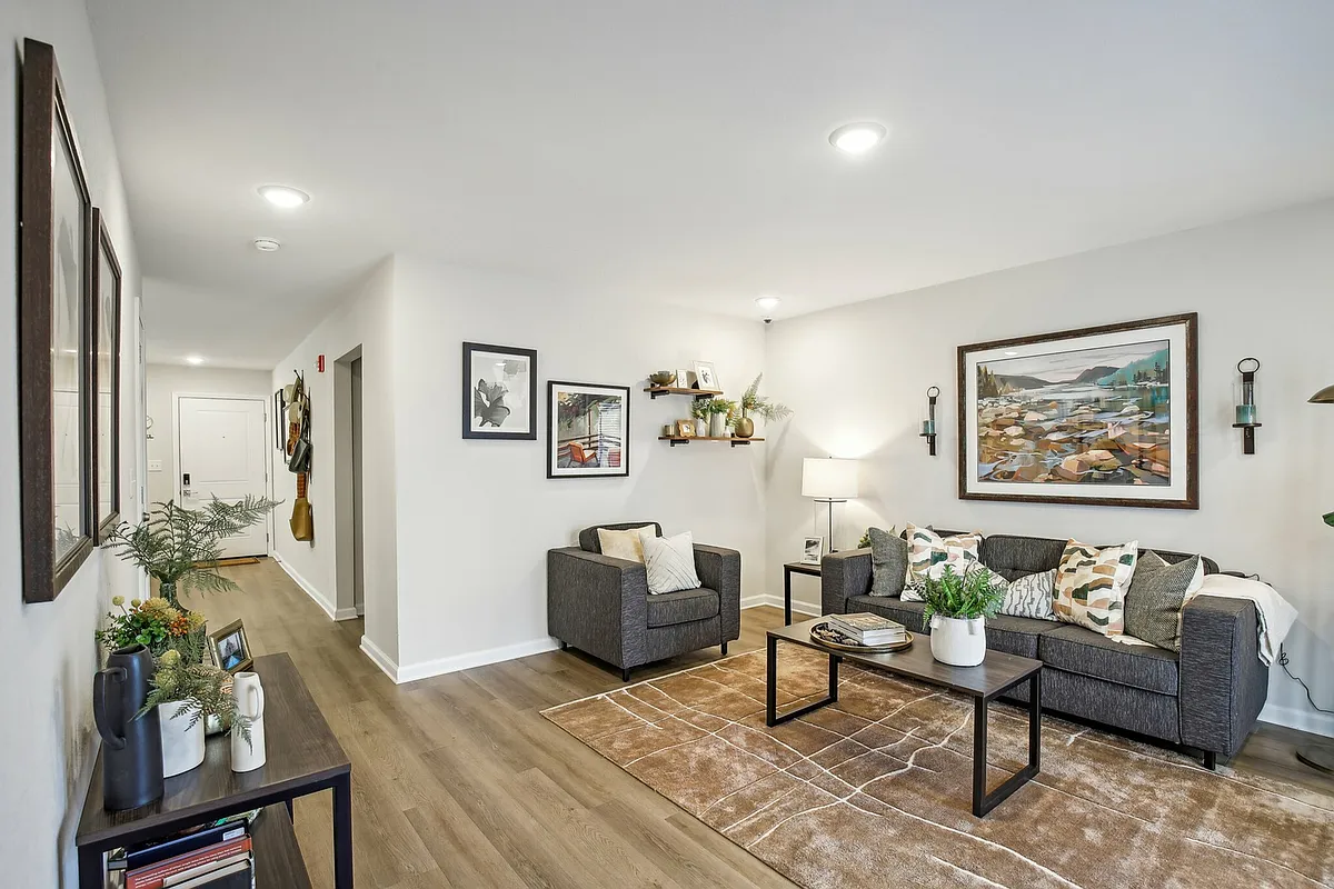 Create a warm and inviting living space with modern decor and spacious design at The Preserve Murfreesboro. - The Preserve Murfreesboro Apartments