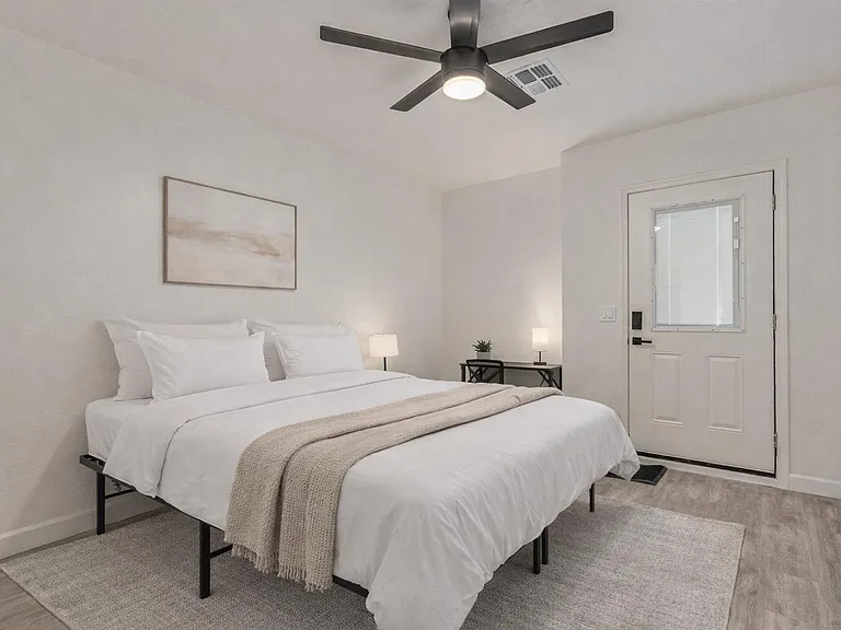 Spacious Room and private entrance. Bedding and rug virtually staged.
