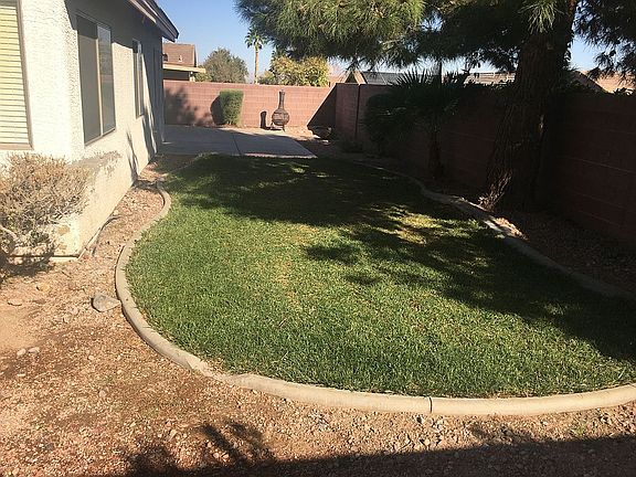 REAR YARD PARTIAL GRASS
