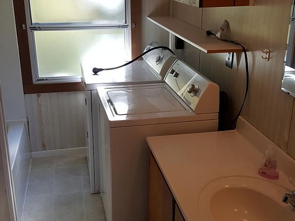 washer and dryer included- Full tub and shower