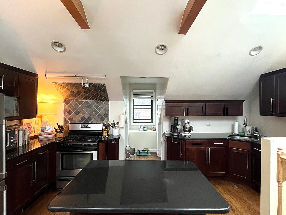 kitchen with island countertop for breakfast bar