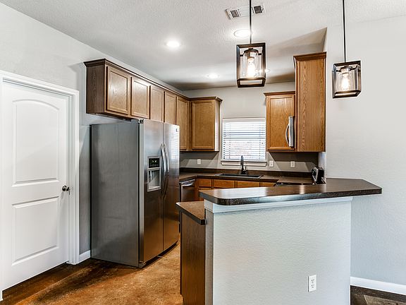 Walk to TCU! Rental home. 4-bedroom property. 3123 Waits 101 Kitchen View A. All stainless steel!
