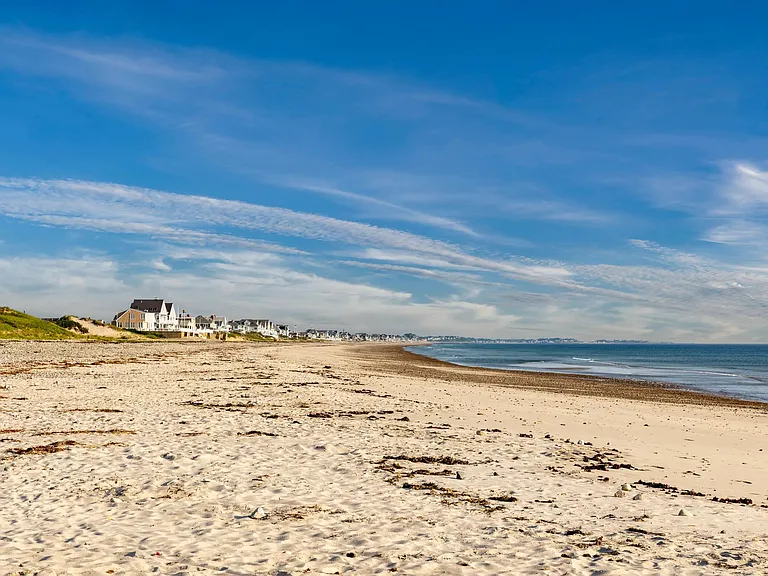 Rexhame Beach offers serene shoreline views just moments from Modera South Shore_your coastal escape is always close.