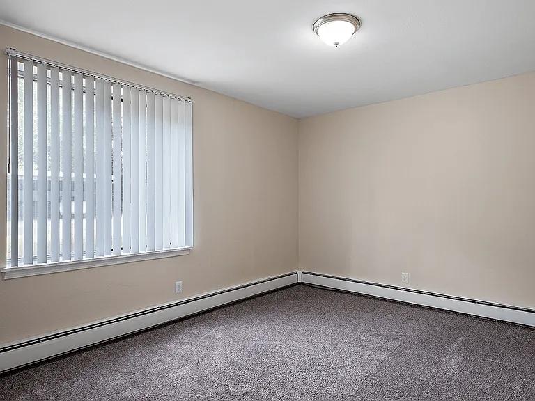 Bedroom with Overhead Light and Window