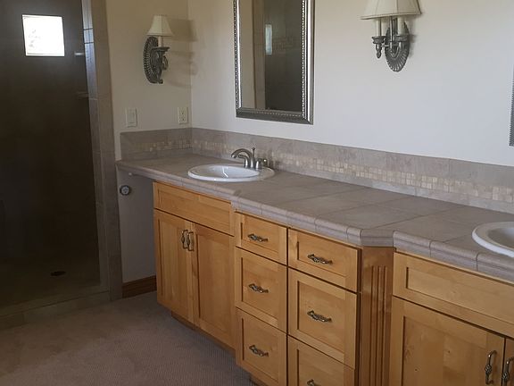 Master bath with steam shower and jetted tub