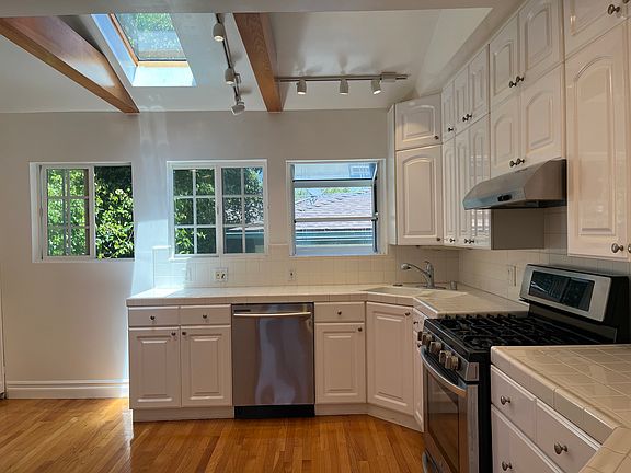 Kitchen w/ all Stainless-steel Appliances - Stove & Dishwasher