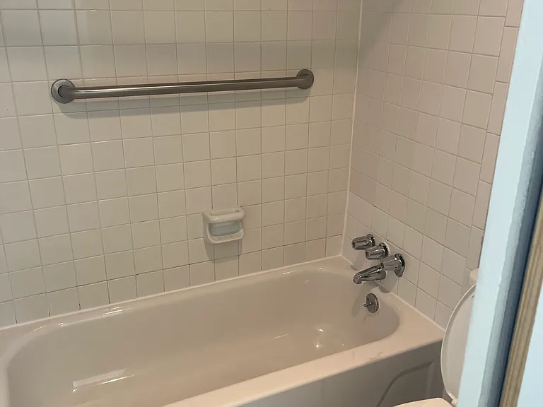 Master bath connects to master bedroom with split layout offering option to close off toilet/bathing area for enhanced privacy while alternate hall entrance enables guest access to sink and vanity space