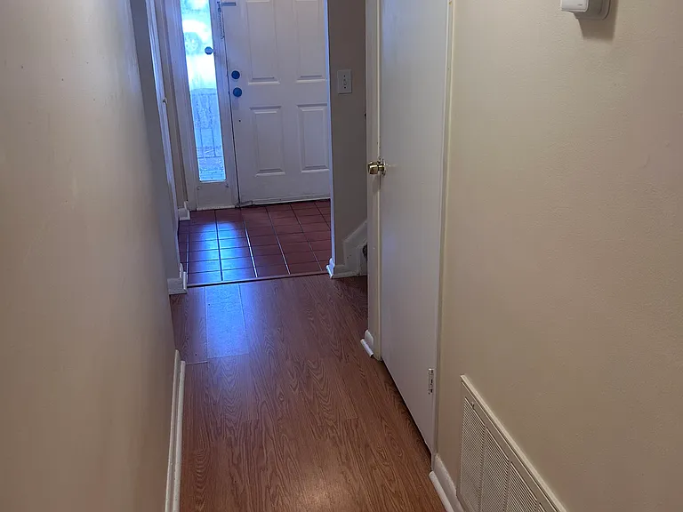 Hallway leading from entry to kitchen