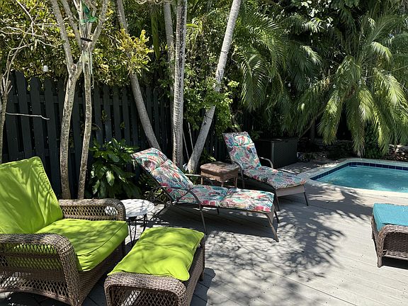Lounge and seating area by pool