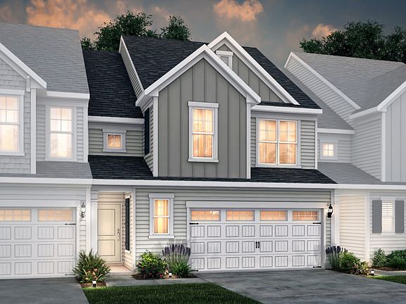 Palomino Exterior 2 features siding, covered front door and 2-car front load garage