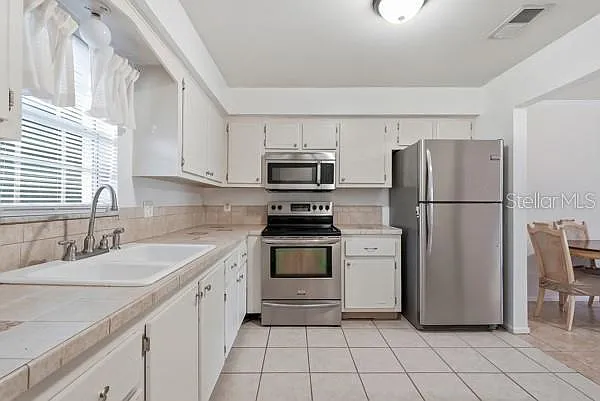 1706 Belleair Forest Dr #136 — Photo 7