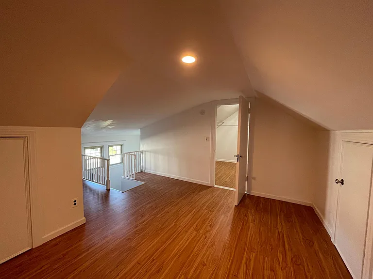 Entry to upper level bedroom with walk in closet