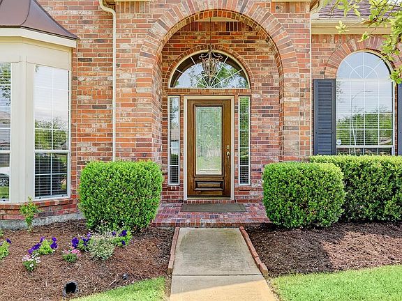 Brick paved front porch and brick all four sides.