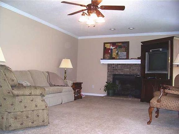 Large Living Room featuring Fireplace with Gas Start