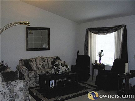 Living room with vaulted ceiling