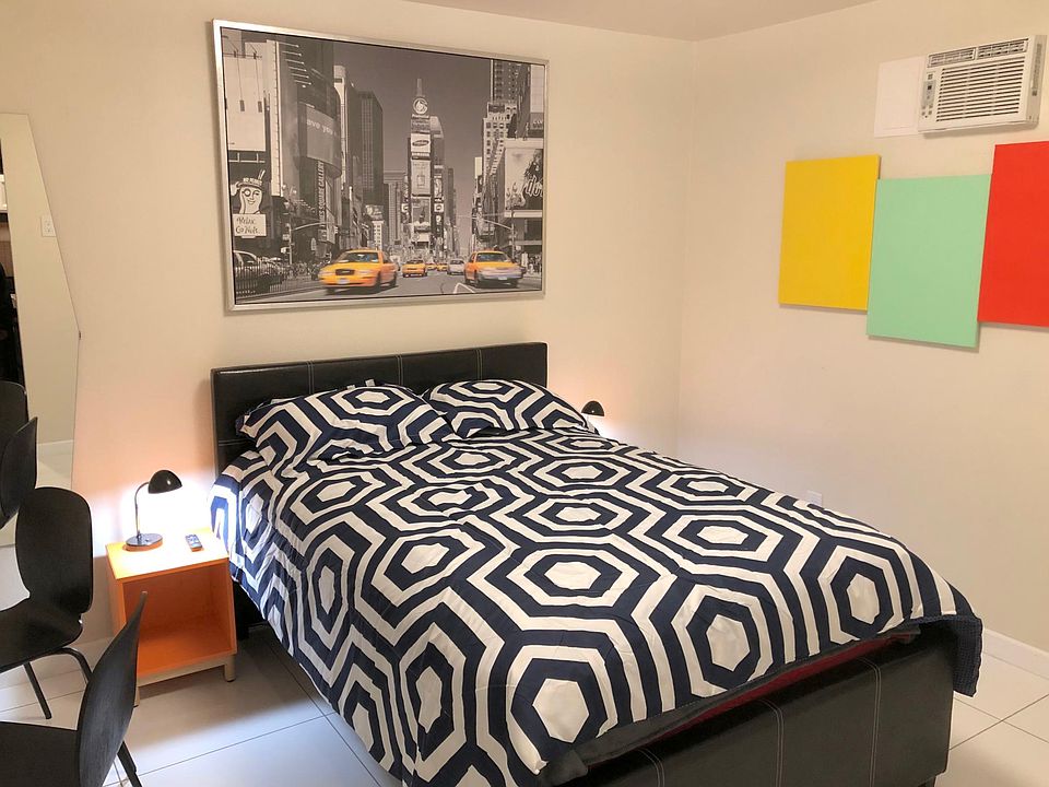 Main living space with full bed.