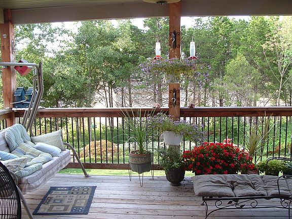 relaxing covered deck beautiful view of sunset