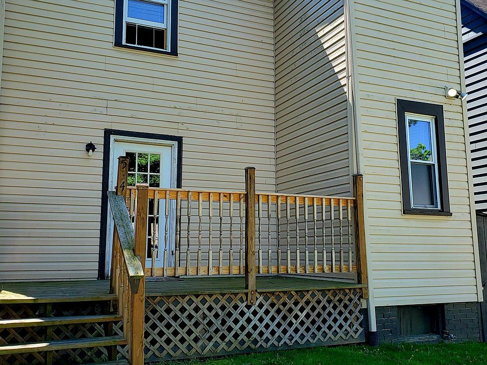 Apartment entrance with a private deck for relaxing! Off Street parking.