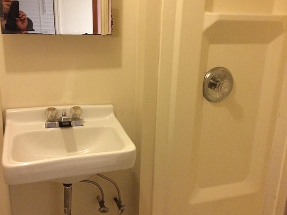 Bathroom shower stall and toilet