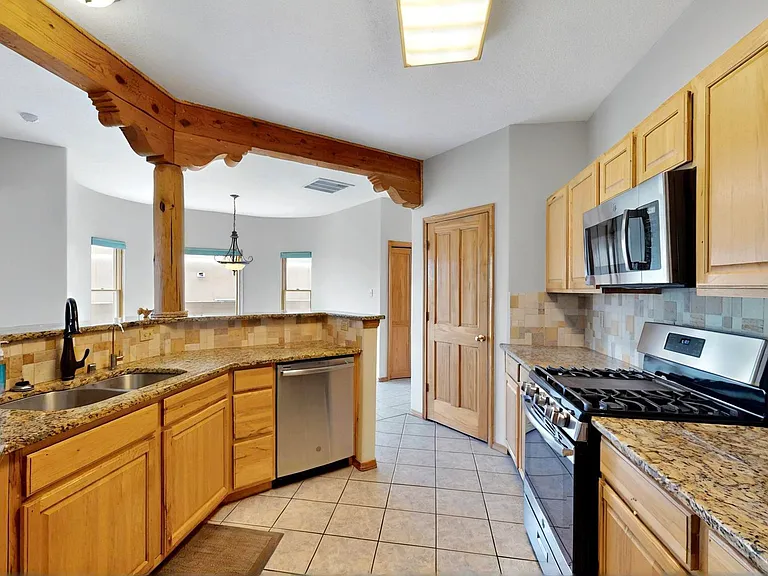 10540 Portofino Dr NW — Photo 9