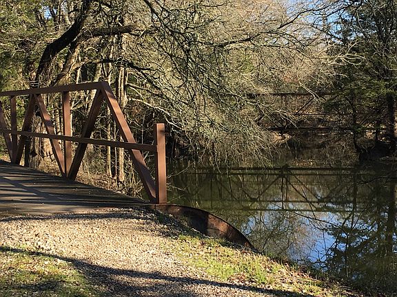 At the North end of property