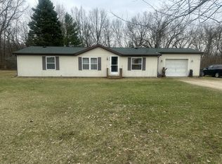 5721 Beecher Rd, Osseo, MI 49266