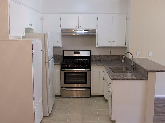 Lots of storage and counter space with fridge!