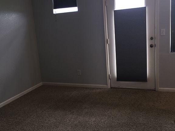 master bedroom with dual sinks, separate bath and shower