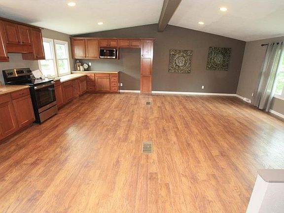 The main floor has been opened up to make a large living room/kitchen area.