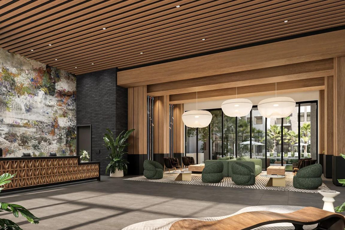 Hotel-inspired lobby with coffee bar.