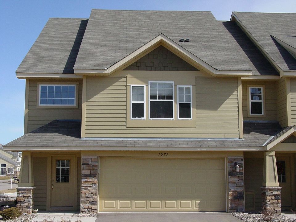 Front w/ 2-car garage