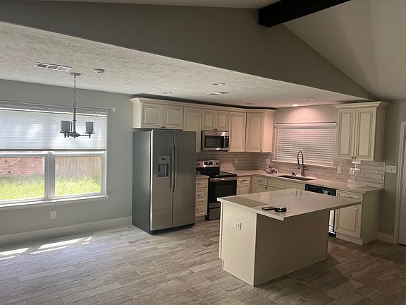 Kitchen with island and breakfast area