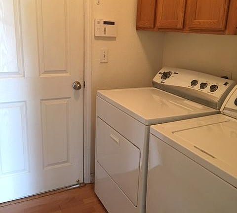 Indoor washer and dryer. Other appliances include new refrigerator and dish washer, plus stove, microwave and garbage disposal.